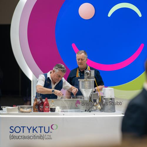 person making food at event