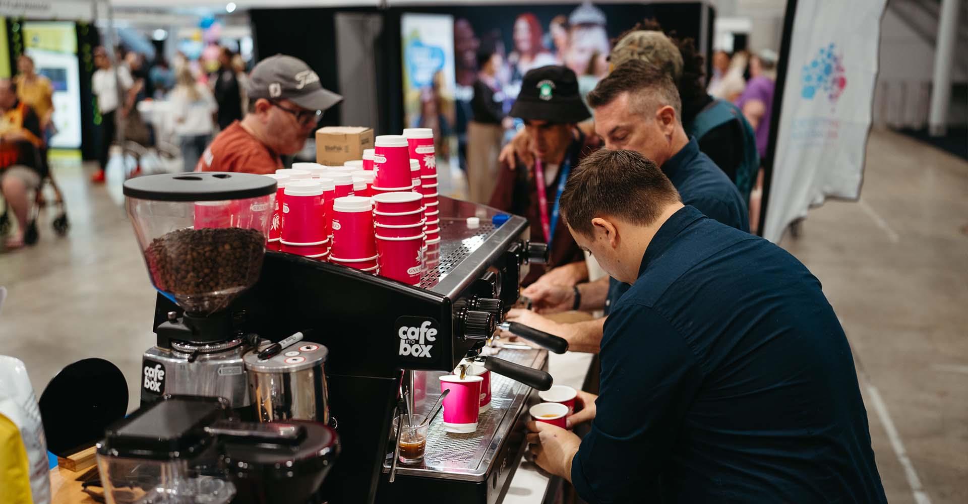 baristas making coffee at function